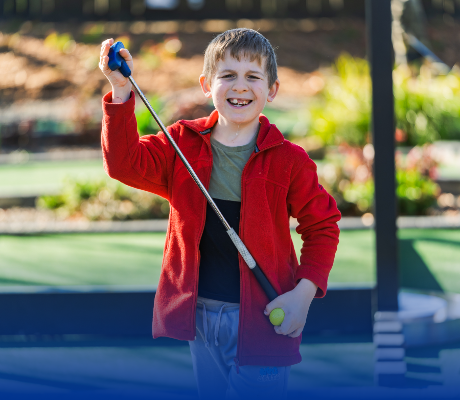 A young golfer at Lions Mini Golf